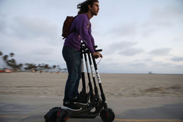 Uber bird scooter electric company maybe leading acquire december Uber bird lime acquisition negotiaton report