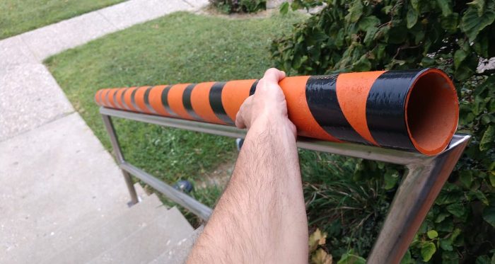 Chute troy builds Halloween covid risk trick or treat candy chute